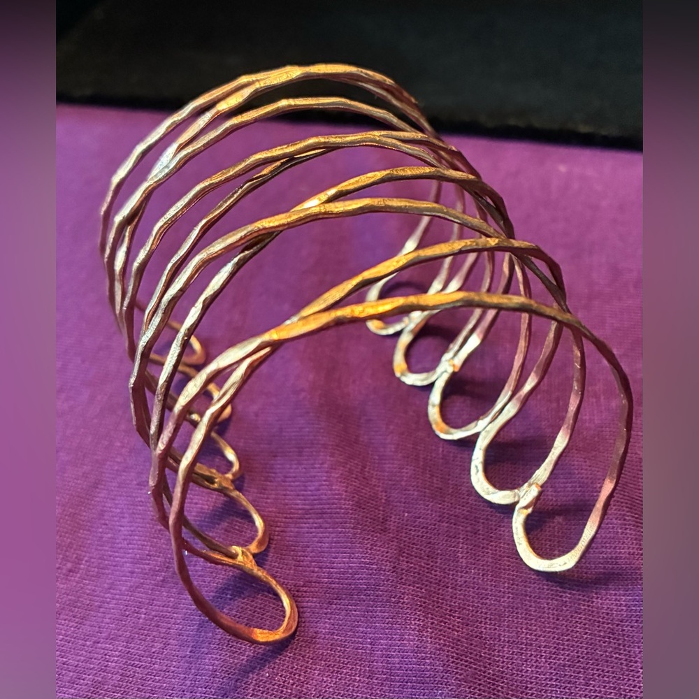 Hammered copper wire cuff bracelet.